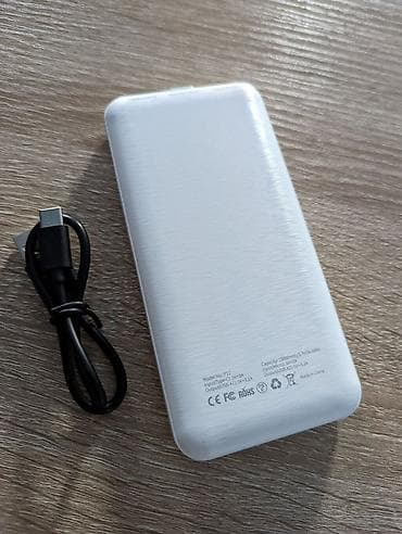 портативные калонки: Портативный аккумулятор (Power Bank) белого цвета покупала за 1700 — 2