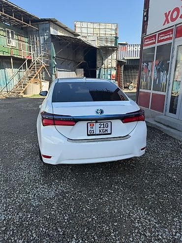 mazda 3 2005: Toyota Corolla: 2019 г., 1.8 л, Автомат, Электромобиль, Седан — 3