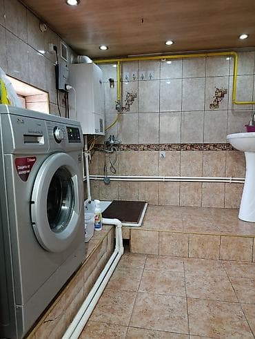 Гаражи: Продаётся кирпичный жилой дом в с.Новопокровка. с хозяйственным — 6