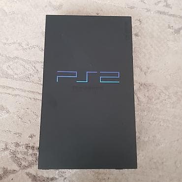 Sony PlayStation 2 (PS2) — игровая консоль в классическом «fat»