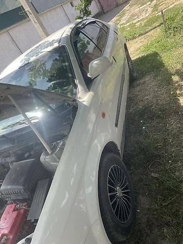 Продажа авто: Daewoo Magnus: 2004 г., 2 л, Механика, Бензин, Седан — 3
