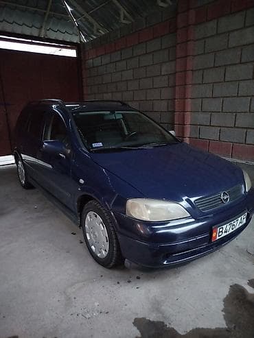 e 302: Opel Astra: 2003 г., 1.4 л, Механика, Бензин, Универсал — 1