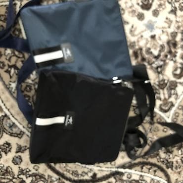 Продаётся барсетки Состояние:новый Цвет:чёрный,синий Цена:999 сом