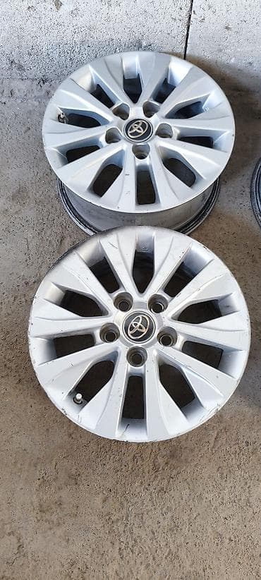Транспорт: Комплект оригинальных литых дисков Toyota (4 шт.) - Диаметр: 15" — 2