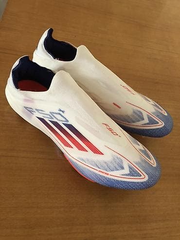 Спорт жана эс алуу: Футбольные бутсы adidas F50+ (без шнурков), FG для натурального — 1
