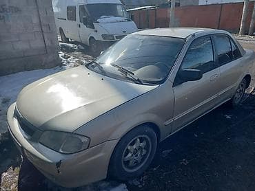 bmw 720: Mazda Protege: 2000 г., 1.6 л, Автомат, Бензин, Седан — 9