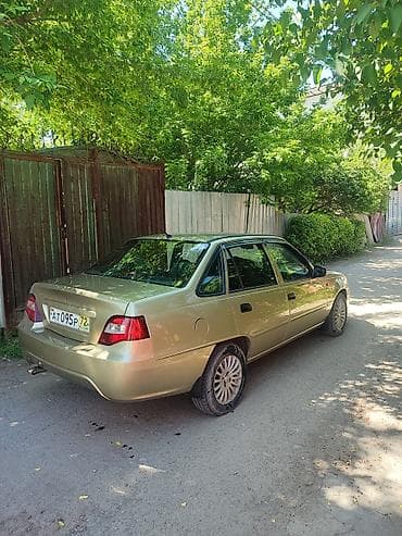 гузгу: Daewoo Nexia: 2011 г., 1.6 л, Механика, Бензин, Седан — 6