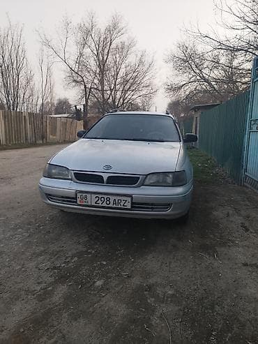 диски на тико: Toyota Carina E: 1997 г., 1.8 л, Газ, Универсал — 2
