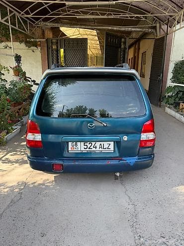 машина капейка: Mazda Demio: 1999 г., 1.5 л, Механика, Бензин — 3