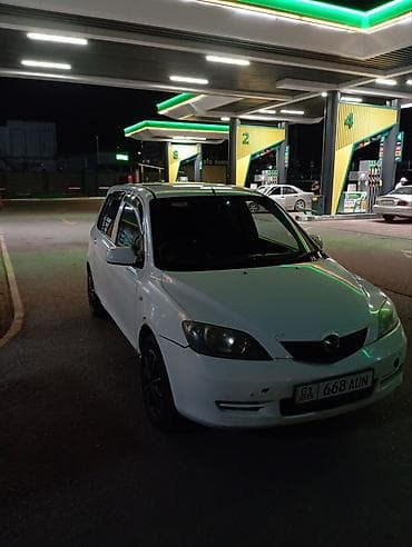 mazda 2: Mazda Demio: 2004 г., 1.3 л, Механика, Бензин, Хэтчбэк — 1