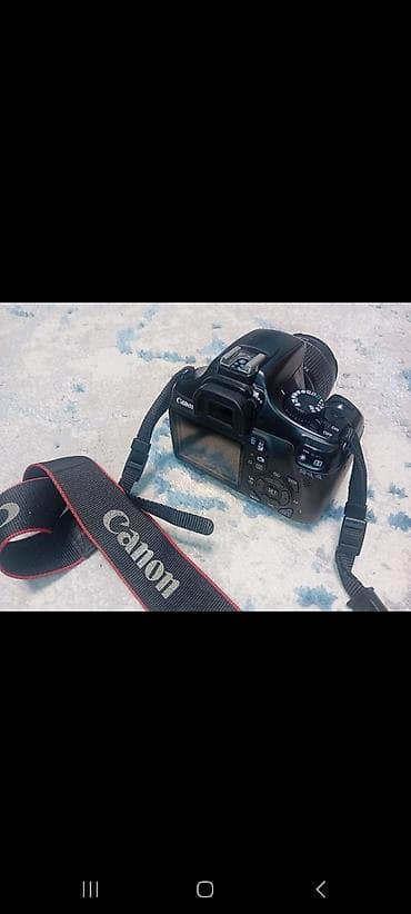 Зеркальная камера Canon EOS 1100D с комплектным объективом Canon EF‑S at lalafo.kg Зеркальная камера Canon EOS 1100D с комплектным объективом Canon EF‑S