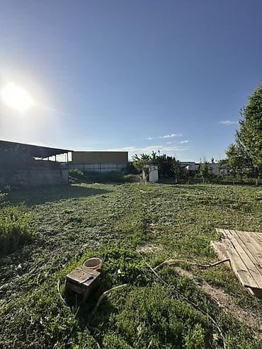 Дома: Продаётся участок 12 соток на первой линии в районе МТФ-2 На участке — 5