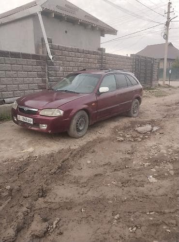 bmv e32: Mazda 323: 2001 г., 1.5 л, Универсал — 6