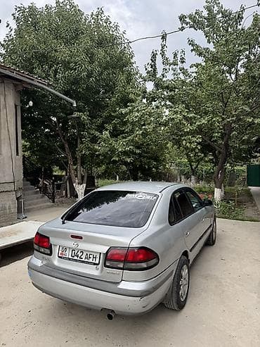 subaru авто: Mazda 626: 1999 г., 1.8 л, Механика, Бензин, Лифтбек — 1