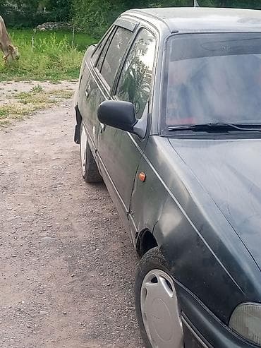 Daewoo Nexia: 2003 г., Механика, Бензин, Седан