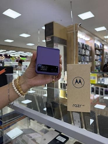 телео: Motorola Razr 40, Новый, 256 ГБ, цвет - Фиолетовый, 2 SIM — 1