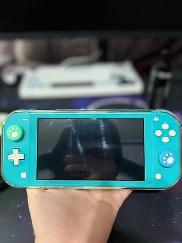 Nintendo: 🎮 **Nintendo Switch Lite — 10 000 сом** Продаю Nintendo Switch Lite в — 1
