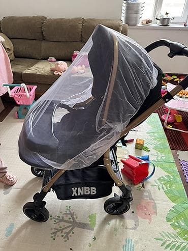 Коляскалар: Удобная детская коляска XNBB в черном цвете с рамой под дерево — 10