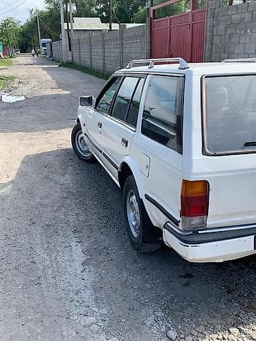 бмв 525 e34: Nissan Bluebird: 1990 г., Механика, Бензин, Универсал — 4