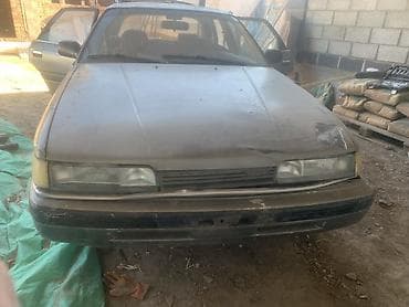 даево нексия 1: Mazda 626: 1989 г., 2 л, Механика, Бензин, Седан — 6