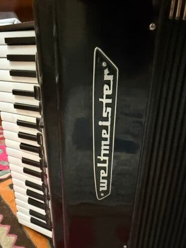 Барабаны: Аккордеон Weltmeister (Германия) - Клавиатурная сторона: 34 клавиши — 1