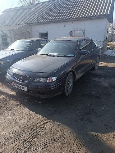 бак мазда демио: Mazda Capella: 1999 г., 1.8 л, Автомат, Бензин, Седан — 10