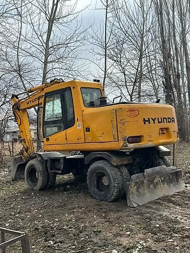 юмз екскаватор: Экскаватор, Hyundai, 2005 г., Колесный — 1