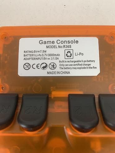 ниже: Портативная ретро‑приставка Game Console R36S (оранжевый прозрачный — 3