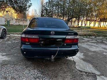 Mazda 626: 1997 г., 1.8 л, Механика, Бензин, Седан