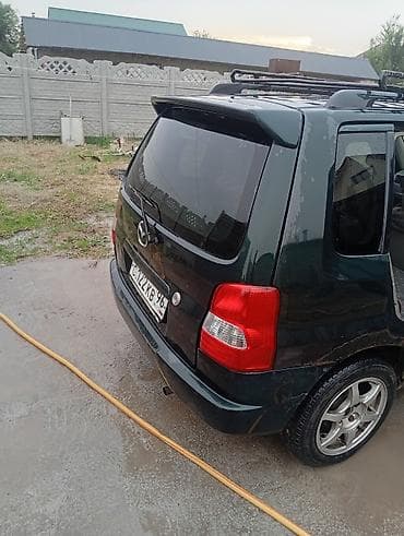 митсубиси спейк стар: Mazda Demio: 1997 г., 1.3 л, Автомат, Бензин — 8