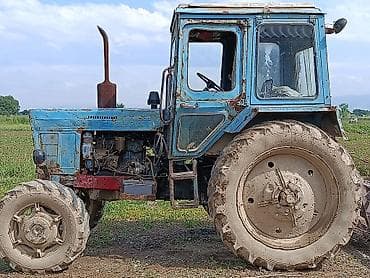 плуг на т25: МТЗ‑82., год выпуска 1990. - Колесный трактор с кабиной. - Дизель — 3