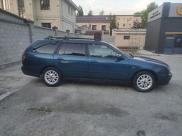 Nissan Primera: 1999 г., 1.8 л, Ручные, Бензин, Универсал — 10