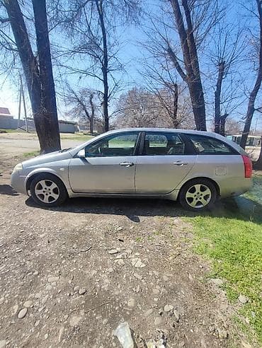 терано 1: Nissan Primera: 2004 г., 2 л, Типтроник, Газ, Универсал — 2