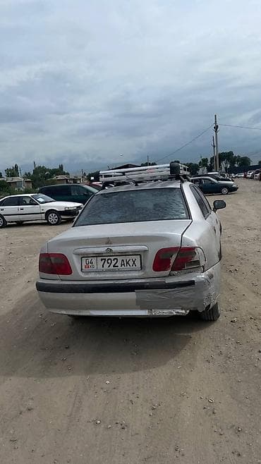 mazda x7: Mitsubishi Carisma: 2002 г., 1.6 л, Седан — 2