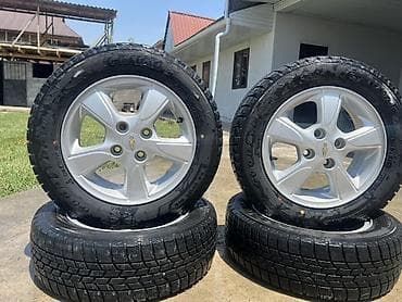 Унаа: Комплект колес Chevrolet на дисках с зимними шинами Goodyear - — 1