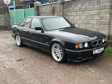боковой тырмо: BMW 5 series: 1991 г., 2.5 л, Механика, Бензин, Седан — 4