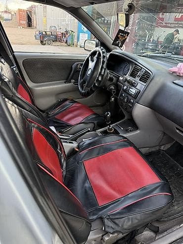 spark premier: Nissan Primera: 2002 г., 2 л, Механика, Бензин, Универсал — 6