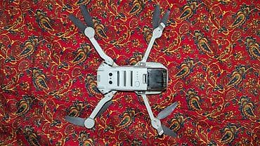 iphone 14mini: Квадрокоптер DJI (серия Mini) Компактный складной дрон серого цвета с — 2