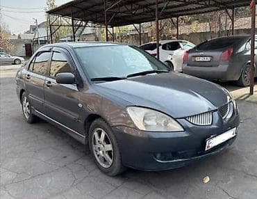 suzuki ignus: Mitsubishi Lancer: 2004 г., 1.6 л, Бензин, Седан — 1