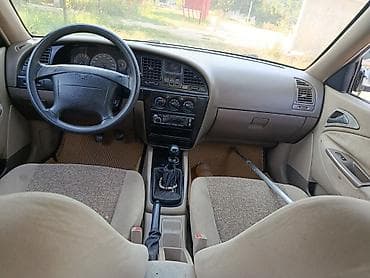 Daewoo Nubira: 2002 г., Механика, Бензин, Седан — 7