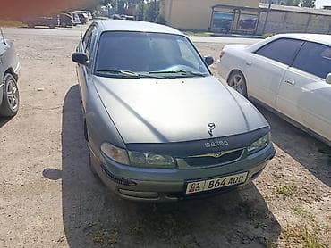 2 4 д: Mazda 626: 1996 г., 2 л, Механика, Бензин, Седан — 2