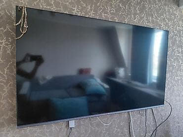oled tv: Телевизор LG LED, диагональ около 65" (примерно 164 см). Тонкие рамки — 1
