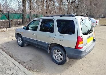 Транспорт: Mazda Tribute: 2001 г., 2 л, Механика, Бензин, Универсал — 1