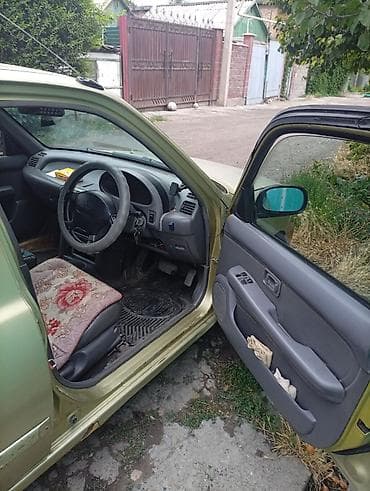 bcd com: Nissan March: 1997 г., 0.1 л, Автомат, Бензин, Хэтчбэк — 4