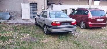 купить запчасти на опель вектра б: Mazda 323: 1998 г., Бензиновая, Седан — 3