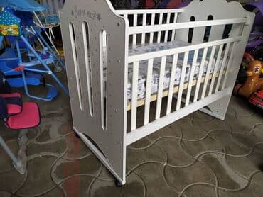 кроватки для детей: Кроватка для новорожденных колесо качалка производство Россия — 3