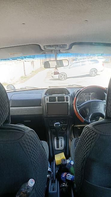 паджеро ио пинин: Mitsubishi Pajero: 1998 г., 1.8 л, Автомат, Бензин, Внедорожник — 5