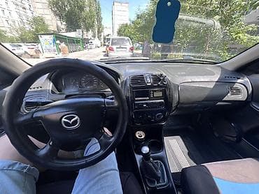 сузики вагон: Mazda 323: 2000 г., 1.6 л, Механика, Бензин, Универсал — 8