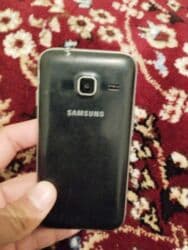 Samsung Galaxy J1 Mini, Б/у, < 2 ГБ, цвет - Черный, 1 SIM