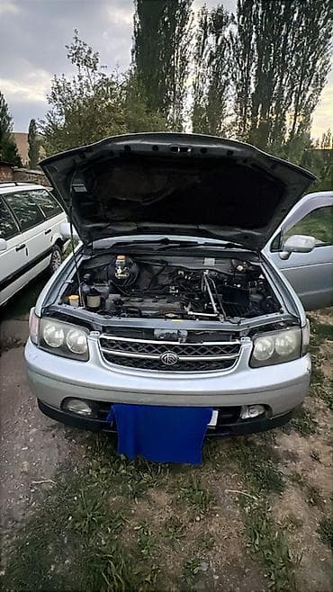 катафот калдина: Nissan R Nessa: 1997 г. — 1